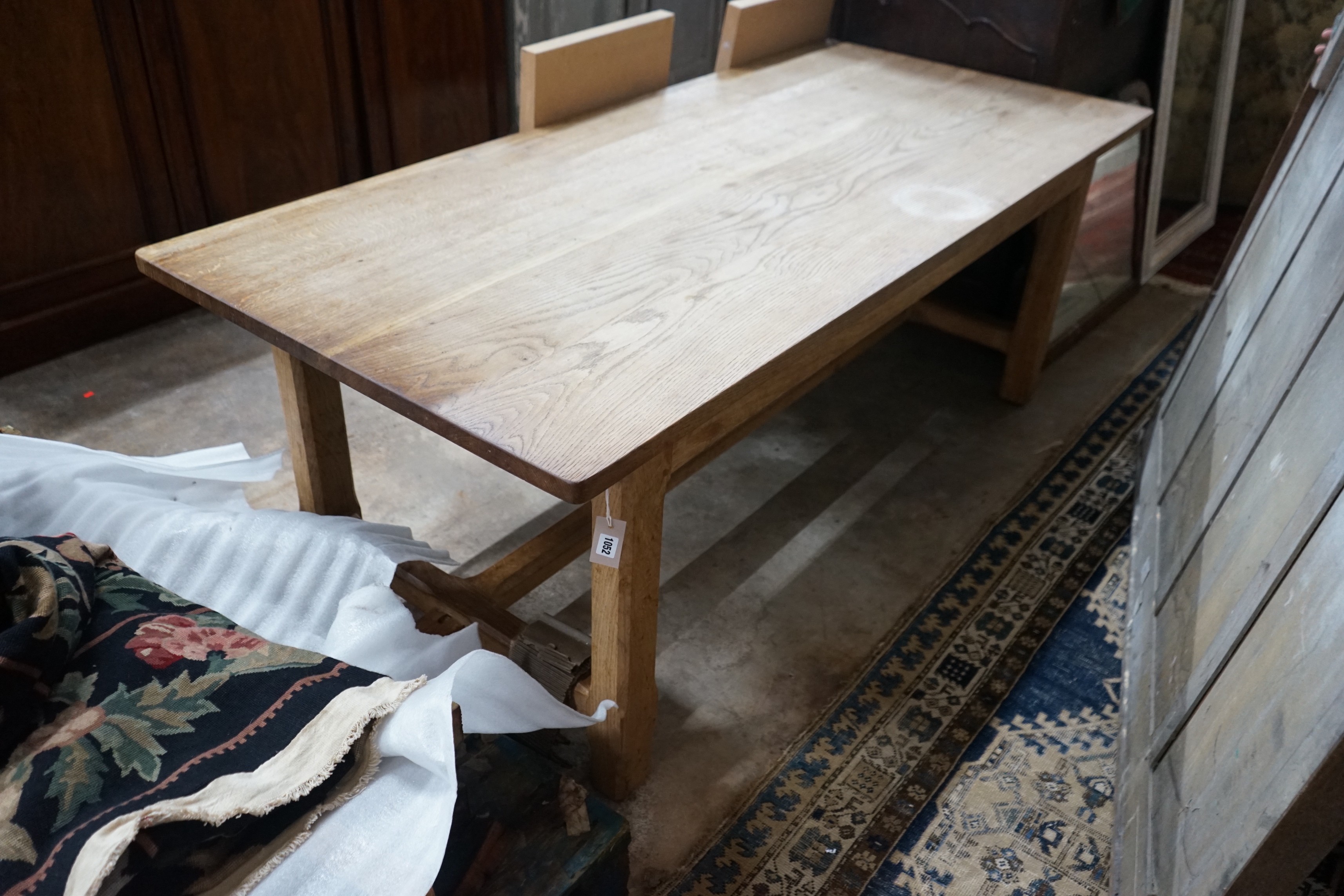 A rectangular oak refectory dining table with later end sections, length 202cm, depth 89cm, height 74cm